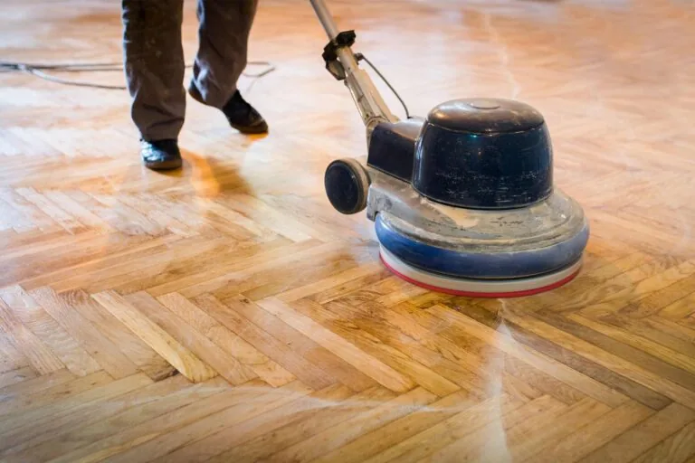 Dustless hardwood floor sanding in progress in a McKinney, TX home