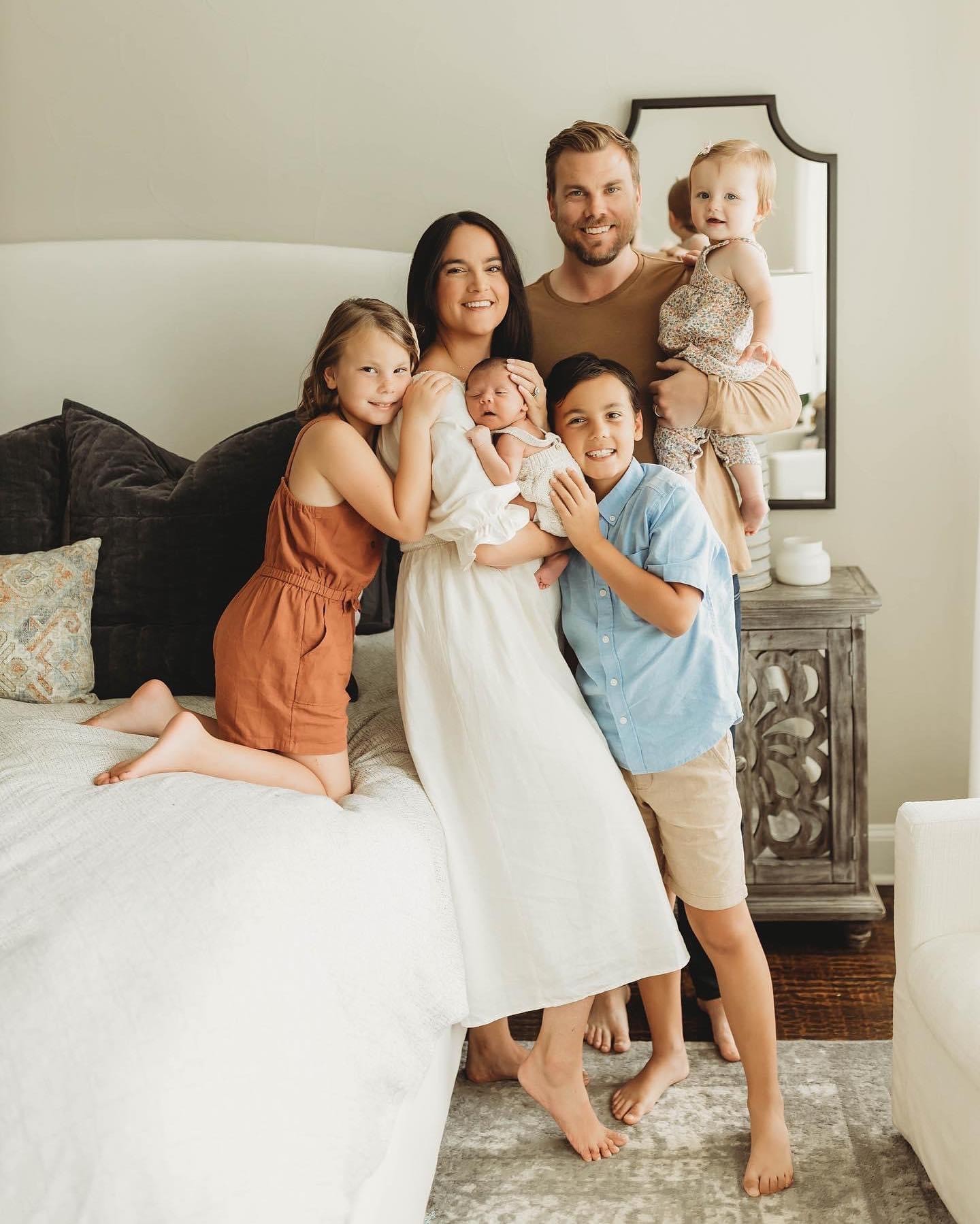 Family in bedroom | McKinney Hardwood Flooring